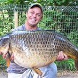 Dan Andrews with a rare visiter to the bank at 42lb